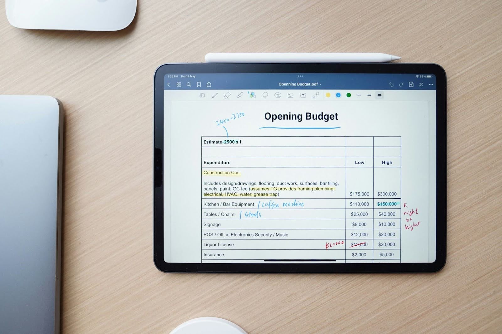 photo of a spreadsheet on a tablet with costs to consider when renovating and remodeling