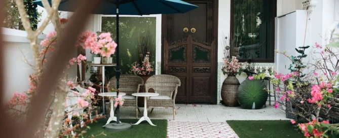 picture of a charming courtyard made with front porch addition ideas featuring a dark wooden door