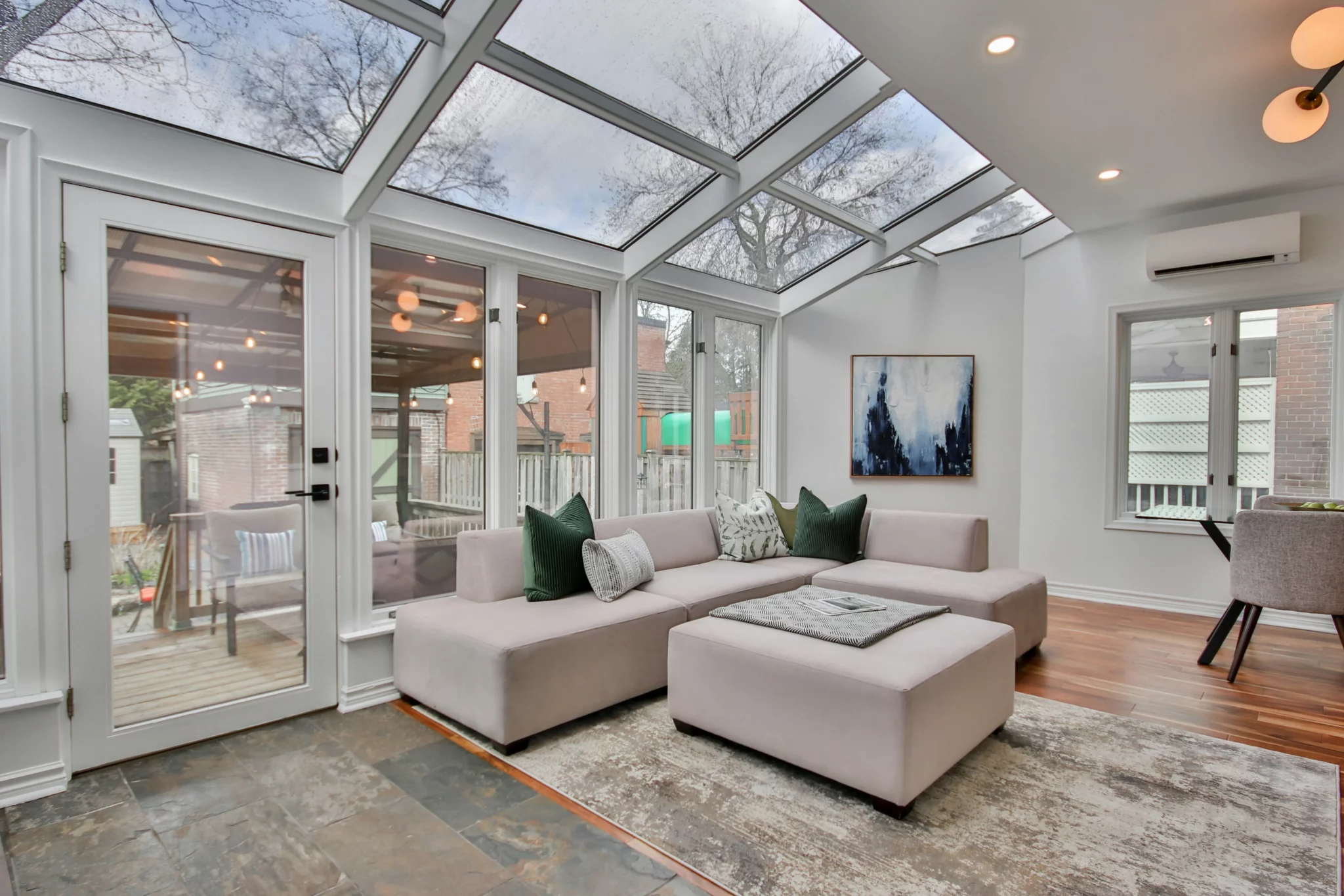 photo-of-a-room-addition-with-glass-skylight-windows