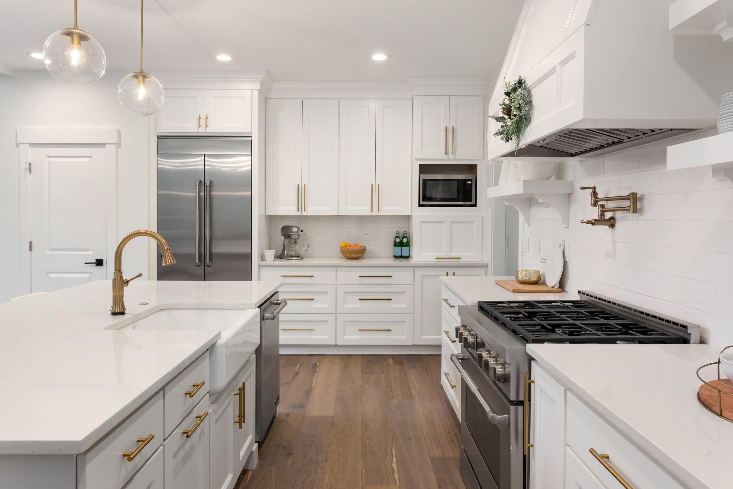 beautiful kitchen in new luxury home with island, pendant lights beautiful kitchen in new luxury home in pasadena with island, pendant lights