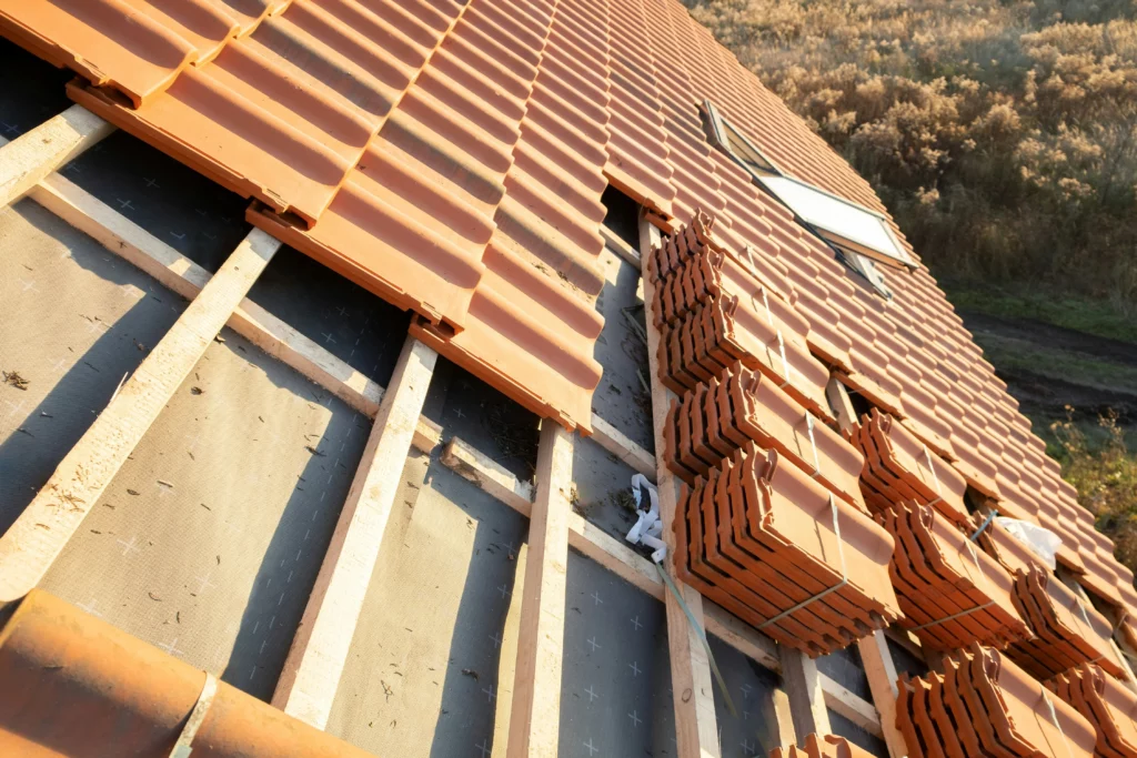 photo-of-a-roof-with-metal-shingles-piled-on-top-of-wood-beams-1024×683 Roof replacement in Los Angeles